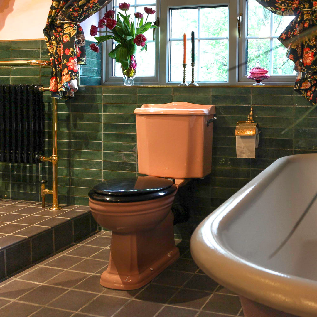 Classic Coral Pink toilet, rolltop bath, colourful interiors, The Bold Bathroom Company